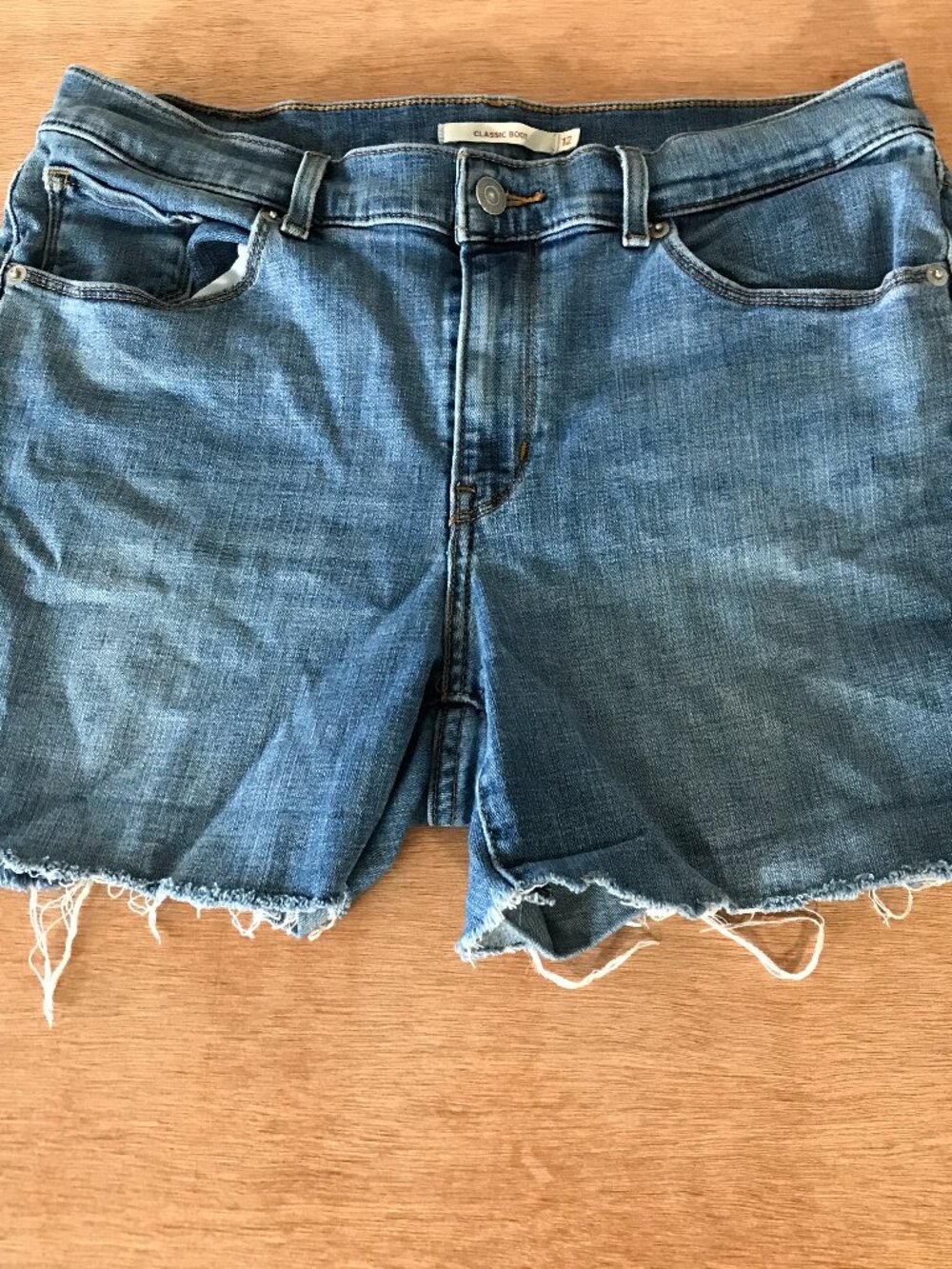 Levi's Medium Blue Distressed Denim Cutoff Shorts
